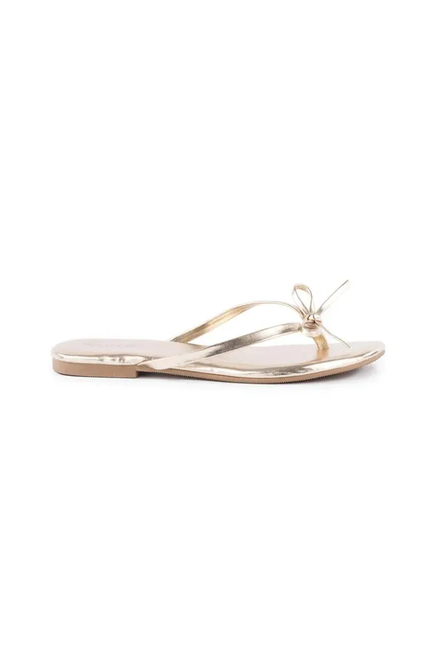 SHOP Trina Turk SHOES WISH LIST METALLIC BOW SANDAL