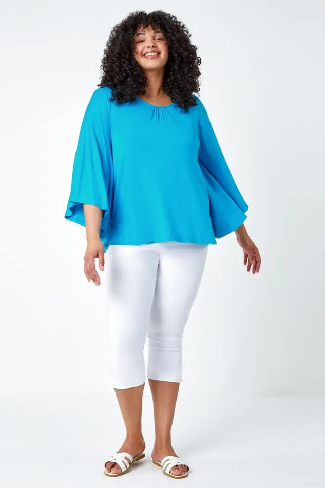 Turquoise Curve Stretch Jersey Cape Sleeve Top Women Roman Tops